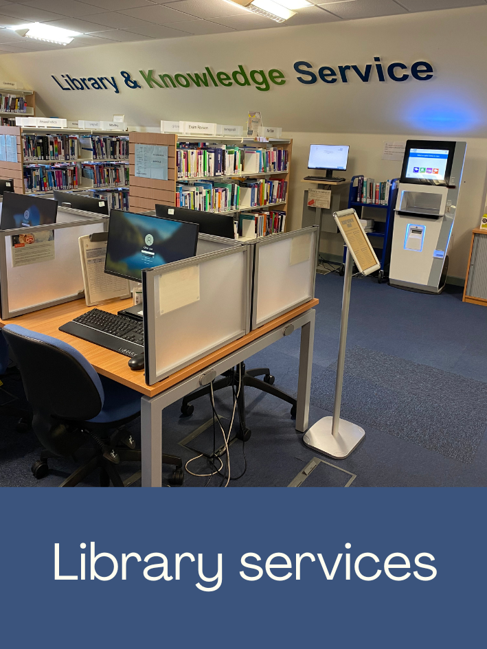 Photo of the library welcome desk. Click to open the Library Services webpage.